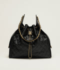 Timeless Quilted Drawstring Chain Bag by Chanel – Black Leather with Gold Hardware