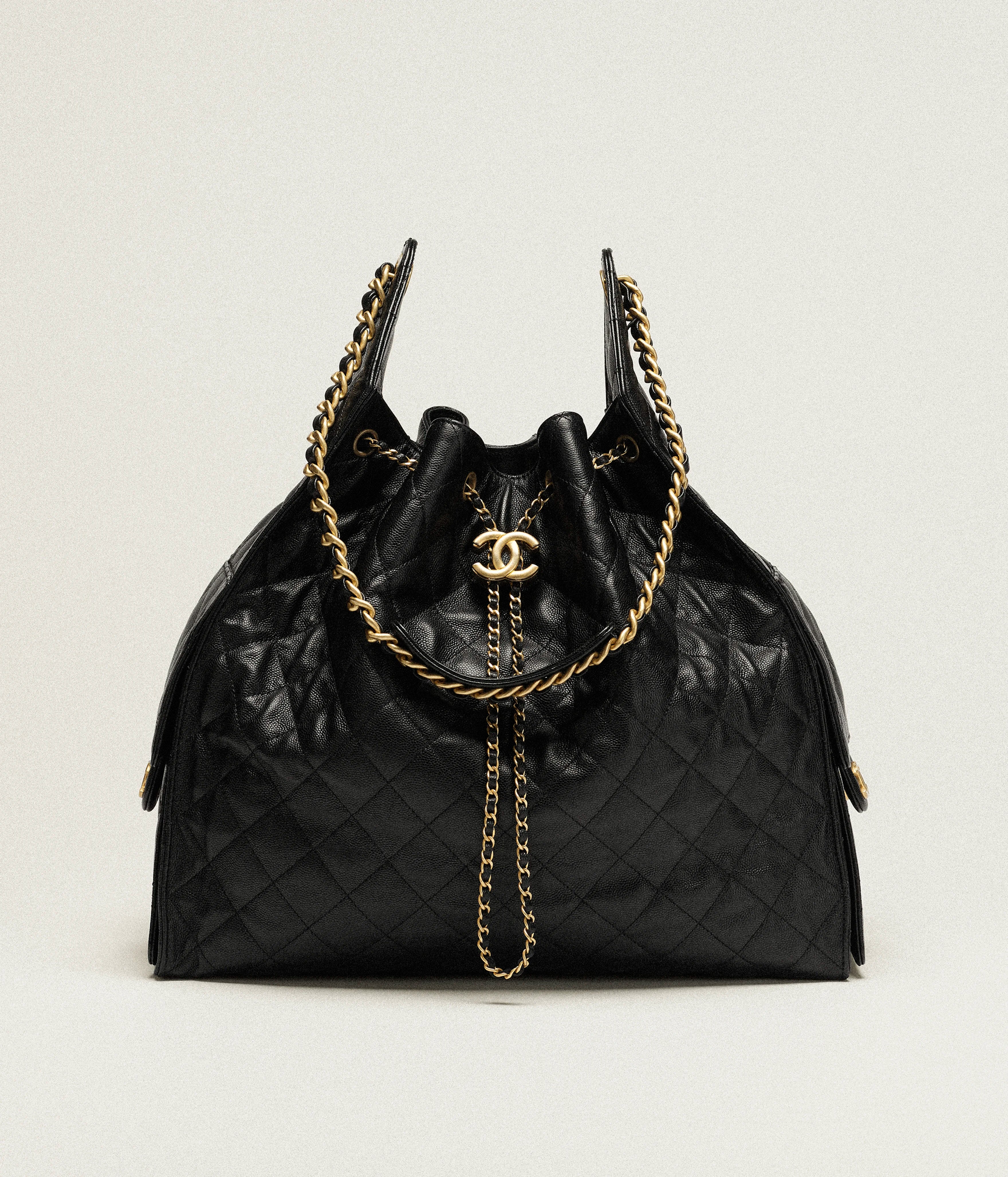 Timeless Quilted Drawstring Chain Bag by Chanel – Black Leather with Gold Hardware
